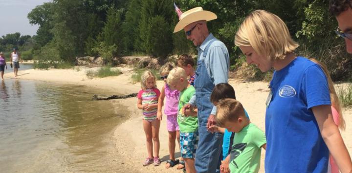 Bernie Fowler walks into Maryland's Patuxent River