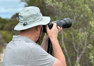 Photographer newsgathering in regional Australia.