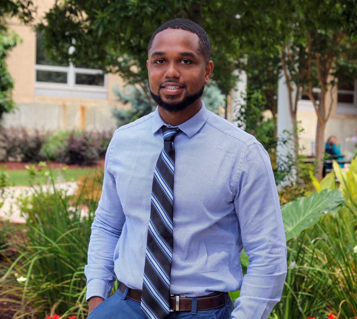 Dr. Justin Xavier Moore