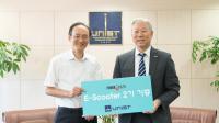 Donation ceremony of E-Scooter