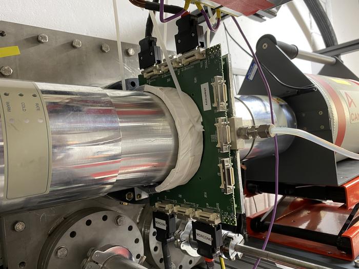 Experimental setup behind the TASCA separator: the first detector array, mounted behind the reaction chamber at TASCA, surrounded by two germanium detectors.