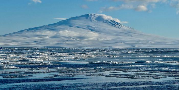 Sea ice and ice floes off Victoria Land, Antarctica, with Mount Melbourne in the background