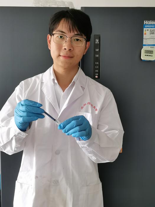 Dr Huang Min
