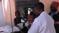 Doctor Examines Snake Bitten Boy on the Morning after His Antivenom Treatment