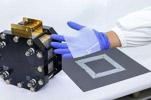 The research team demonstrates the completed BNNF-added gasket composite.