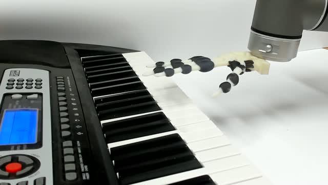 Robot Hand Playing Jingle Bells