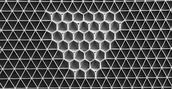 Transforming Material Topology with a Drop of Liquid