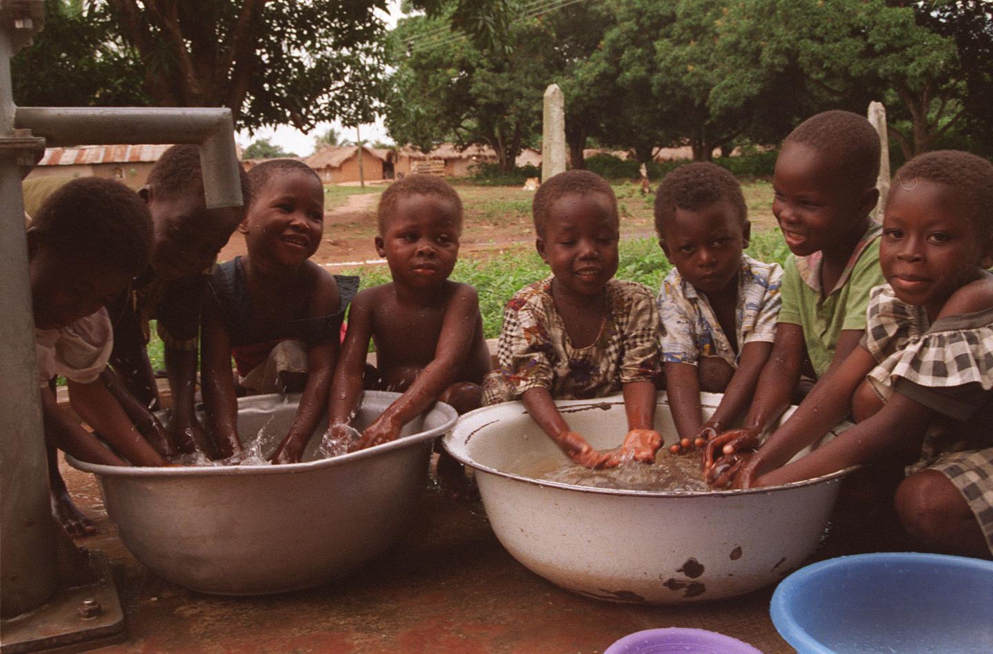 Children at Hand Pump