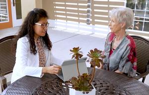 Yin Allison Liu reviews results of virtual eye exam