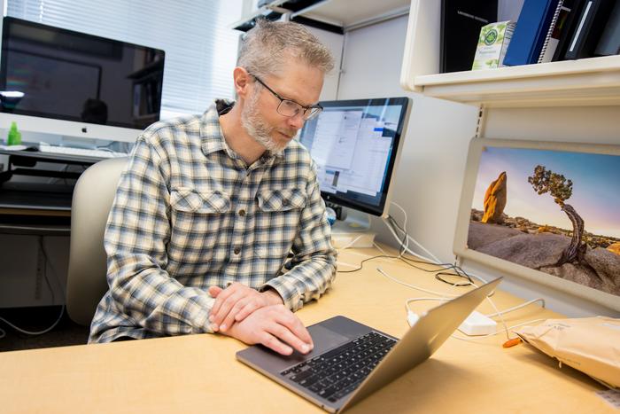 Chris Gregg at computer