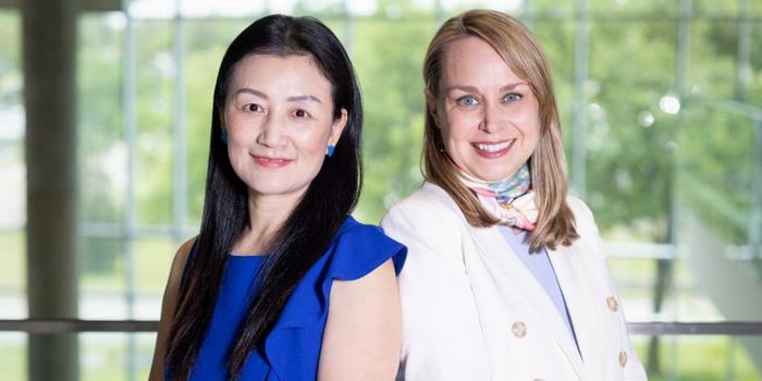 UT Arlington social work professors Ling Xu, Noelle Fields