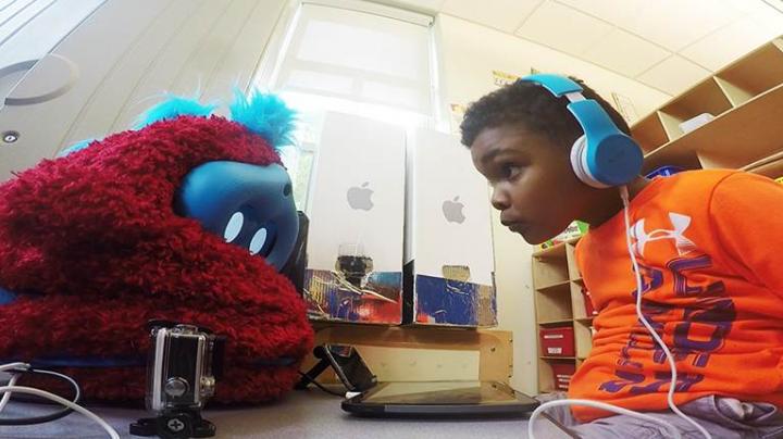 Preschooler with Robot
