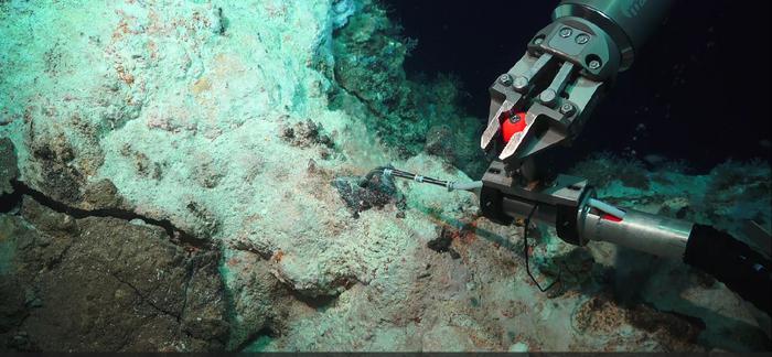 The ROV samples an active hydrothermal system off the Greek island of Milos. The shimmering water reveals hot hydrothermal fluids venting from the ocean floor.