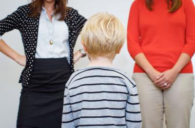 Boy Deciding Between Mean and Nice Experts