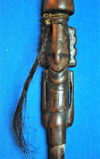 Image Showing Detail of the Carved Anthropomorphic Figure on Snuffing Tube
