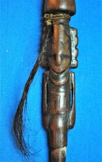 Image Showing Detail of the Carved Anthropomorphic Figure on Snuffing Tube