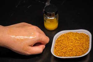 Close up of the pollen-based sunscreen applied to skin