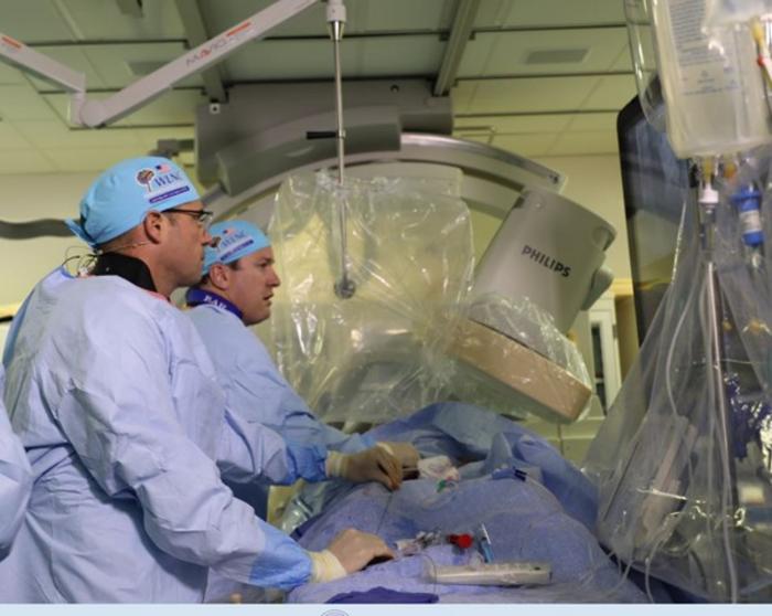 Global neurosurgeons collaborating through digital platforms and virtual case discussions