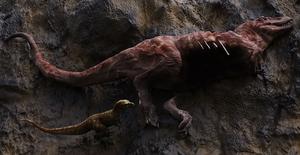Visualization of a tyrannosaur scavenging on a larger conspecific.