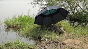 Krock robot in Uganda by the banks of the Nile River, avoiding overheating.
