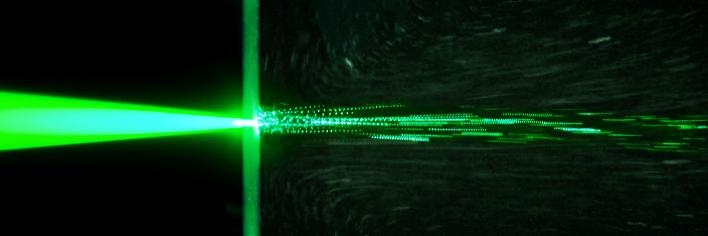 Through Glass Etched with Gold, Laser Beam Triggers a Flow of Liquid (1 of 4)