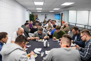Participants in ICS Cybersecurity Lab Training (ICS 301 Training, for short) gather for lunch at the training facility on Lindsay Boulevard in Idaho Falls.