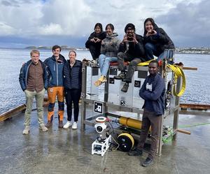 Researchers atop the underwater docking station