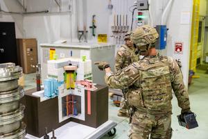 U.S. Army NDT soldiers from the 20th CBRNE Command review procedures during a validation field exercise at INL’s TREAT facility.