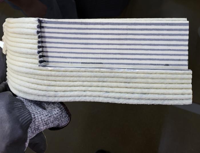 Cross section of core-and-sheath beads