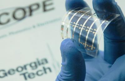 Top-Gate Organic Field-Effect Transistor with Bilayer Gate Insulator