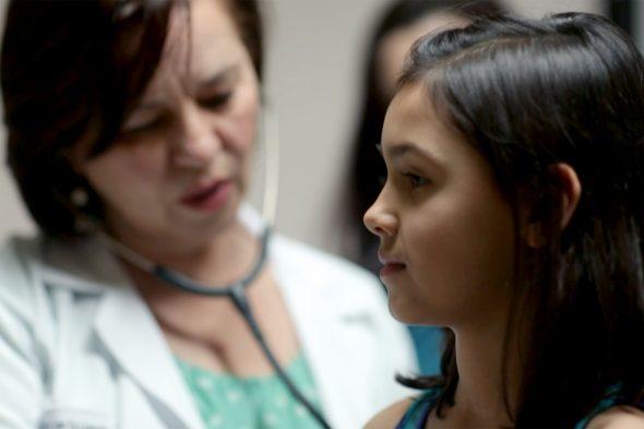 Doctor with Pediatric Patient