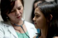Doctor with Pediatric Patient