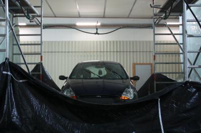 A Car Tested under a Rain Simulator