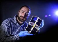 Dr. Elias Aboutanios with Cubesat