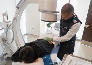 Dr. Brian Braithwaite with Patient