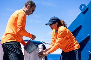 Theo Anagnostopoulos and Rachael Zoe Miller collecting samples