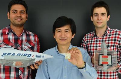 Scientists Holding the New Underwater MEMS Sensors