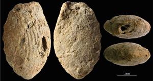 A butterfly clay bead from the Final Natufian period