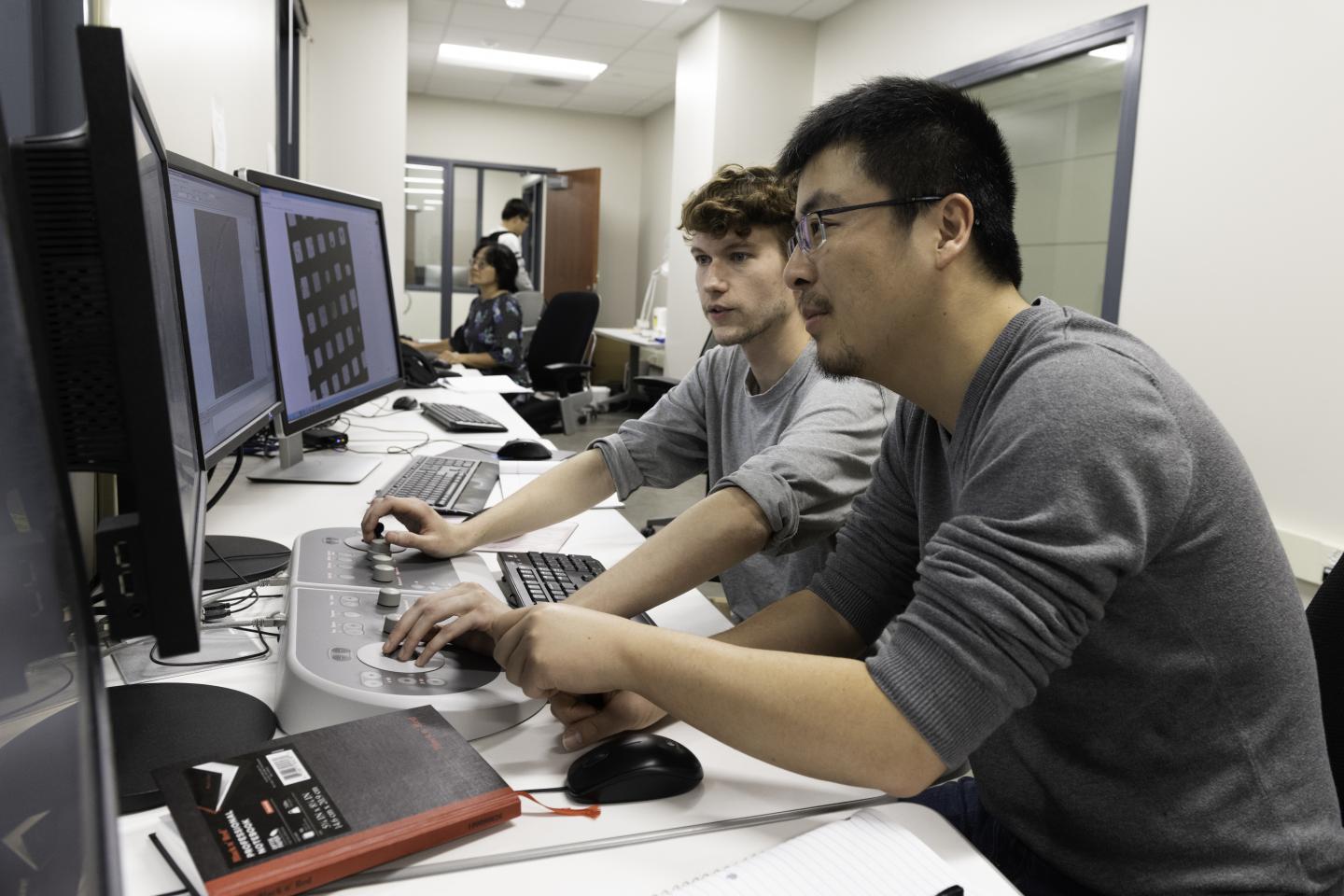 Nianshuang Wang and Daniel Wrapp Collect Cryo-EM Data