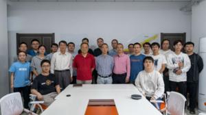 The picture features Dr. Qian Wang, Dr. Xinliang Yan, as members of Professor Meng Wang's research group from State Key Laboratory of Heavy Ion Science and Technology, Institute of Modern Physics, Chinese Academy of Sciences.