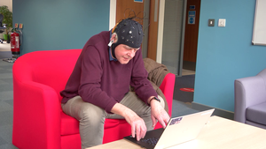 A volunteer takes part in the Fastball EEG test