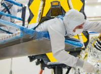 Technician Folds Webb Sunshield