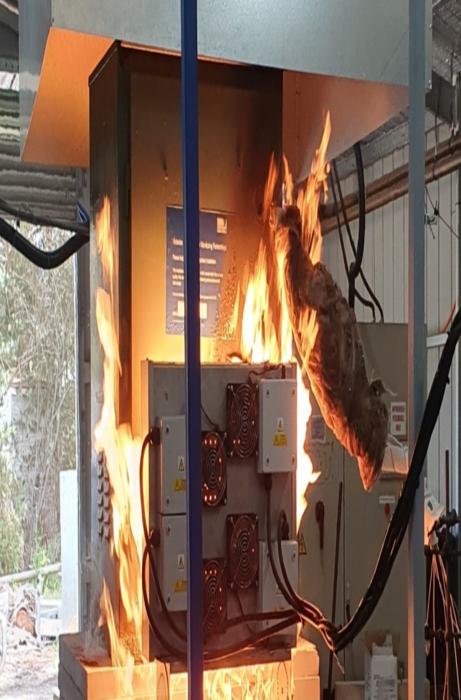 Insulated instrumentation cabinet undergoing simulated wildfire testing.
