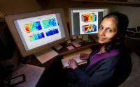 Amala Mahadevan with a Model Showing the Role of Eddies in the Bloom