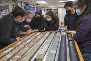 Scientists and sediment core
