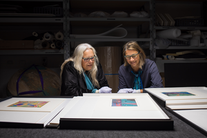 Kathleen Toomath and Michelle Broun with the children's works.