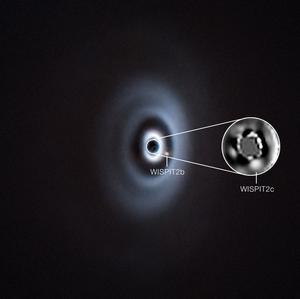 Very Large Telescope images of two planets (WISPIT 2b and the newly discovered WISPIT 2c) forming around the young star WISPIT 2.