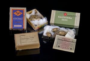 During the initial excavation in 1948, there was a shortage of equipment and packaging materials.