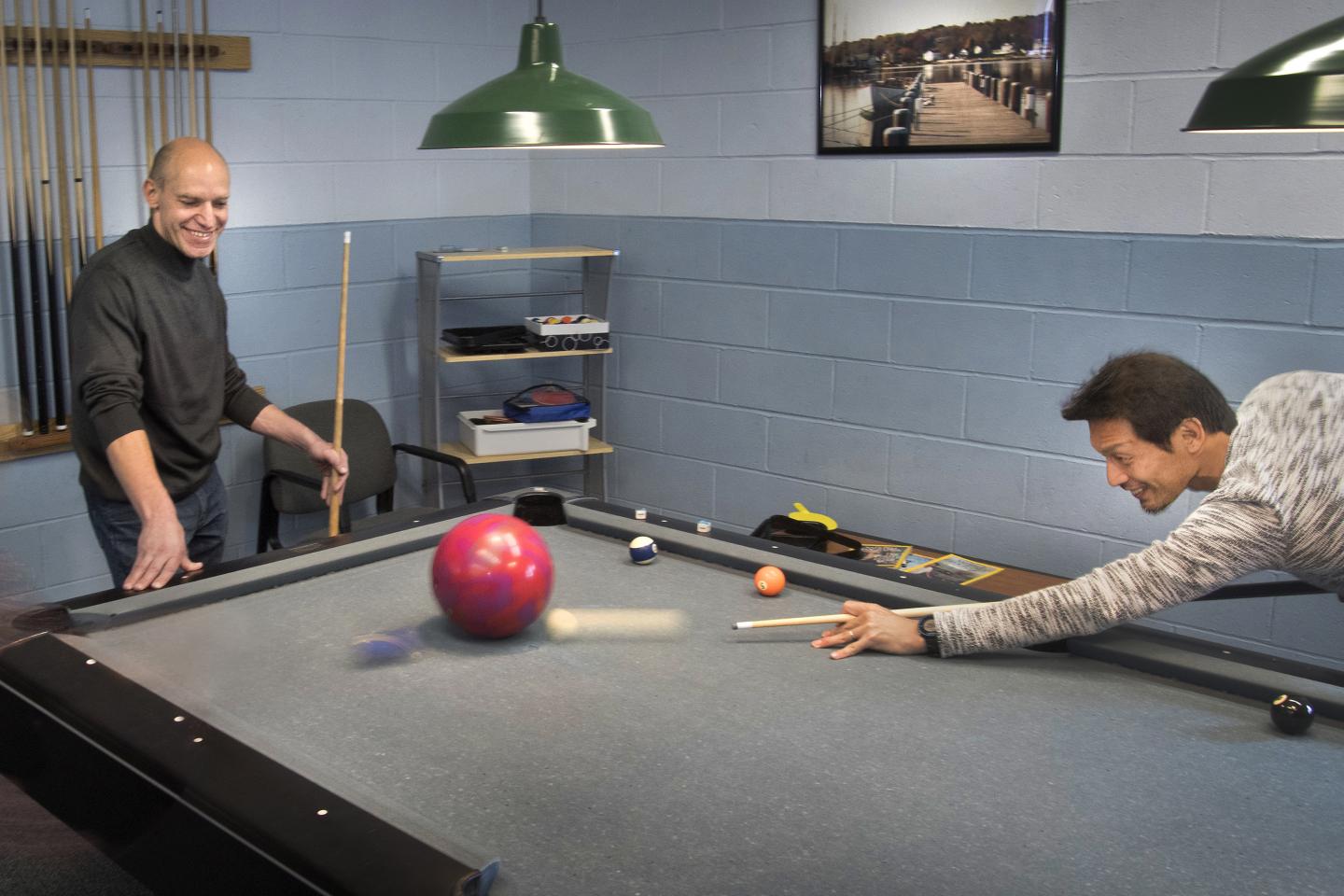 Particle Collisions with Billiard Balls