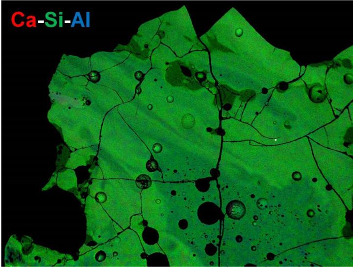 Combined X-ray maps of the polished surface of the sample studied which indicates the Ca-Si-Al chemical compositional variation.